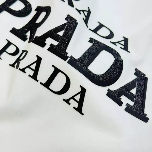Cheap Prada T-Shirts Short Sleeved For Unisex #1343939 Replica Wholesale [$72.00 USD] [ITEM#1343939] on Replica Prada T-Shirts