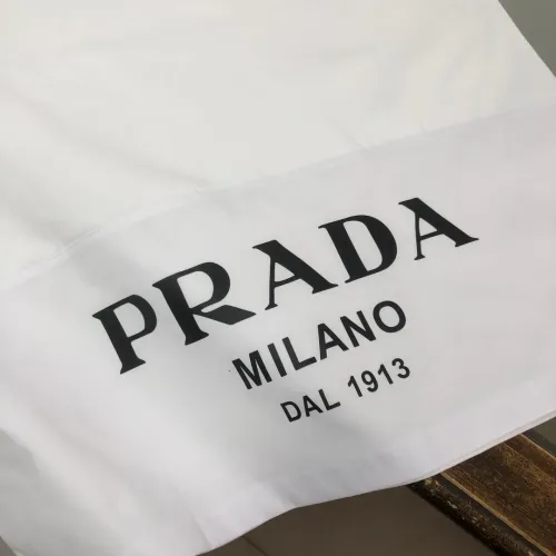 Cheap Prada T-Shirts Short Sleeved For Unisex #1431118 Replica Wholesale [$34.00 USD] [ITEM#1431118] on Replica Prada T-Shirts