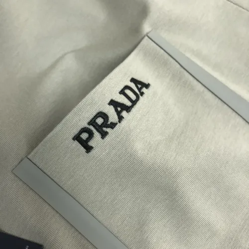 Cheap Prada T-Shirts Short Sleeved For Unisex #1431122 Replica Wholesale [$34.00 USD] [ITEM#1431122] on Replica Prada T-Shirts