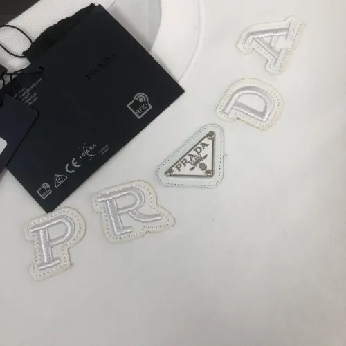 Cheap Prada T-Shirts Short Sleeved For Unisex #1431216 Replica Wholesale [$34.00 USD] [ITEM#1431216] on Replica Prada T-Shirts