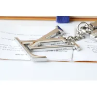 Cheap Louis Vuitton LV Key Holder And Bag Buckle #1425354 Replica Wholesale [$25.00 USD] [ITEM#1425354] on Replica Louis Vuitton LV Key Holder And Bag Buckle