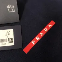 Cheap Prada T-Shirts Short Sleeved For Unisex #1431119 Replica Wholesale [$34.00 USD] [ITEM#1431119] on Replica Prada T-Shirts